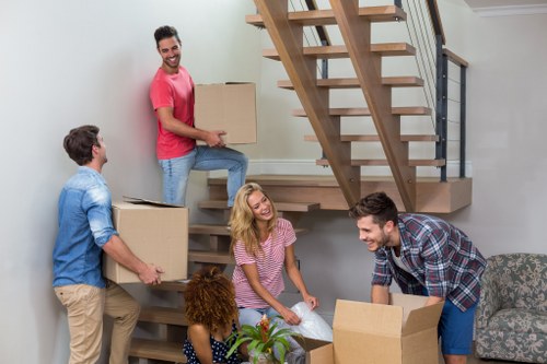 Removal company team preparing boxes for a Wimbledon home move