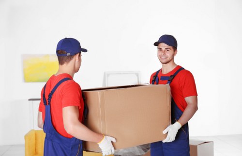 A moving team reviewing a customer complaint form