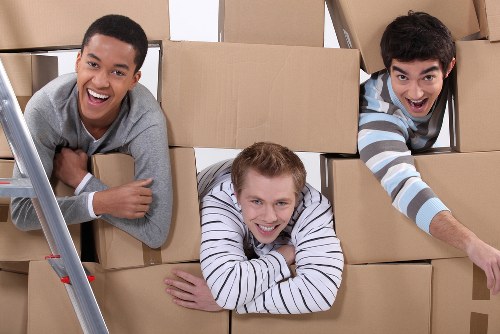 Removal team planning a Wimbledon house move near local residential streets