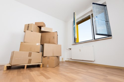 Loading furniture into a van for transport in Wimbledon